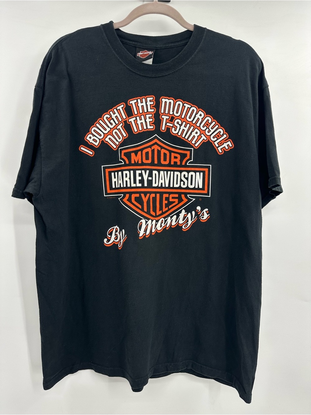 Harley-Davidson Monty’s Black T-Shirt with Orange and White Logo